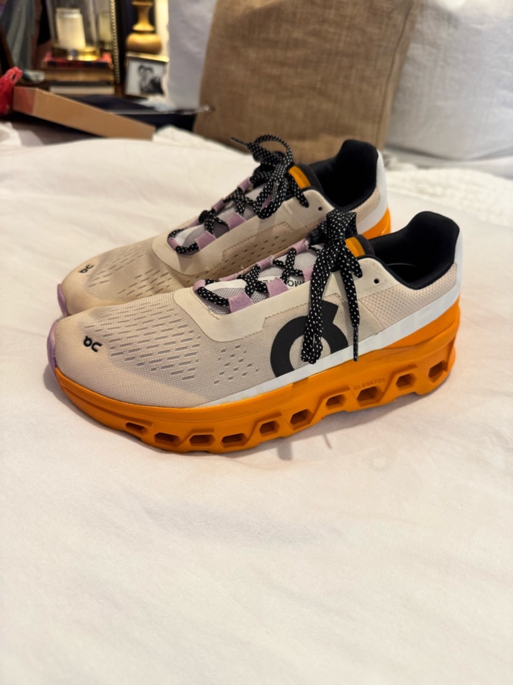 On Running Cloudmonster Shoes in Beige, Orange, Black